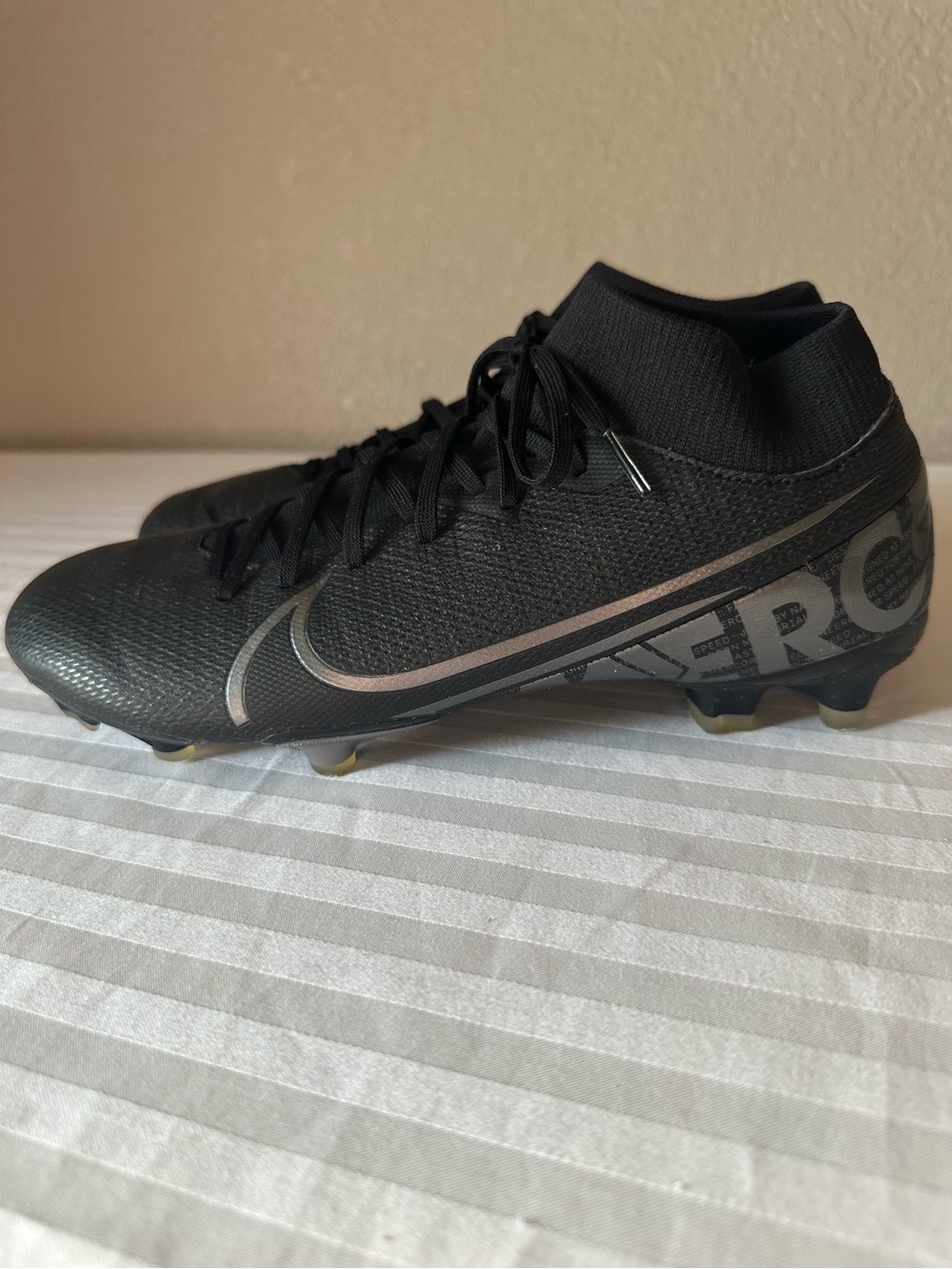 Nike Black High-Top Mercurial Soccer Cleats with Silver Swoosh